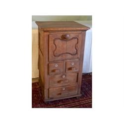 Oak cabinet with four locking drawers