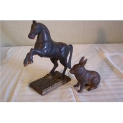Two cast iron banks:  horse; Rabbit