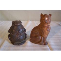 Two cast iron banks, cat and toad