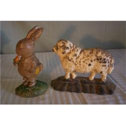 Two cast iron door stops