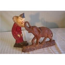 Clown door stop, cast metal elephant