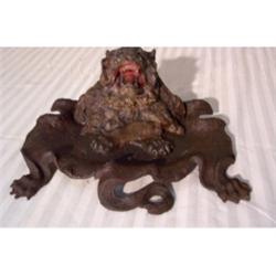 Cast iron lion motif ink well