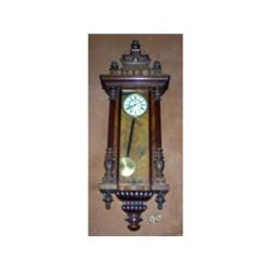 Antique wood wall clock with burl trim
