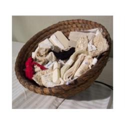 Basket full of vintage lace and trim