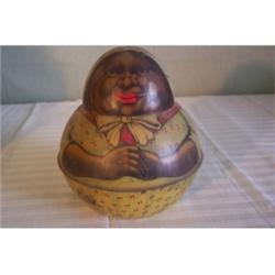 Black memorabilia Roly-Poly tin