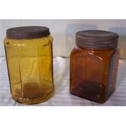 Two amber jars