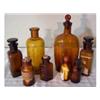 Image 1 : Eight assorted amber glass bottles