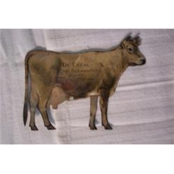 De Laval tin advertising cow