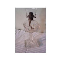 Clear glass oil lamp with chimney