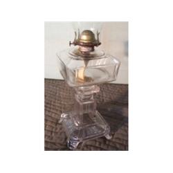 Large, clear glass oil lamp
