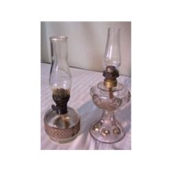 Two small oil lamps