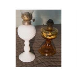 Two small oil lamps
