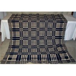 Blue and white tile pattern coverlet