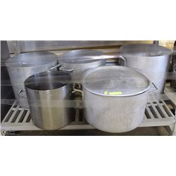 BOTTOM SHELF OF MISC LARGE STOCK POTS