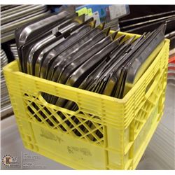 MILK CRATE FULL OF INSERT LIDS OF VARIOUS SIZES