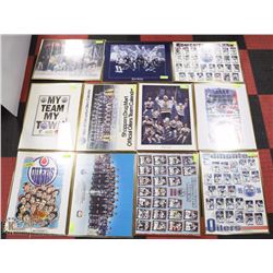 COLLECTION OF 11 ASSORTED FRAMED OILERS POSTERS