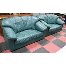 PAIR OF GREEN LEATHERETTE LOVE SEATS.
