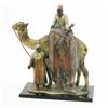 Image 1 : A 1930’s spelter match strike group, of two Middle Eastern carpet traders and a Camel on plinth b...