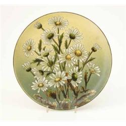 A Linthorpe earthenware plate, painted with chrysanthemums and monogrammed LH, 11.5ins...