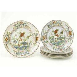 A set of 5 Italian maiolica side plates, and a slightly larger plate, all with floral decoration...