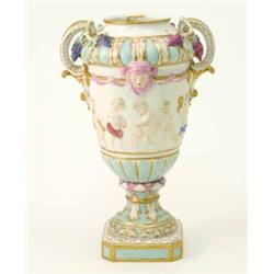A Berlin 2-handled vase, with moulded frieze of putti, 10.5ins...