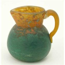 A French Art glass pitcher signed G. de Feuvre, circa 1910 with acid etched green to orange shadi...
