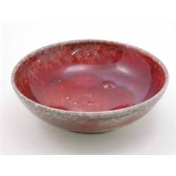 A Ruskin high-fired bowl, with mottled grey and crimson glaze, impressed mark and date 1927, 9.5"...