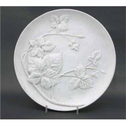 A Linthorpe plaque designed by Christopher Dresser, unglazed, decorated in high relief with bramb...