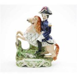 A Staffordshire portrait figure of General Pelissier, soldier on rearing horseback, on naturalist...