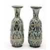 Image 1 : A pair of Royal Doulton vases by F. Butler, incised with stylised foliage within beaded bands, 18...