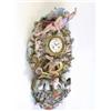Image 1 : A large Meissen wall clock, circa 1860-80, the circular drum dial set into a tall shell and scrol...