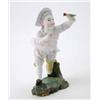 Image 1 : A Hochst figure of a boy leaning forward with outstretched arm, holding a bird and wearing a pale...