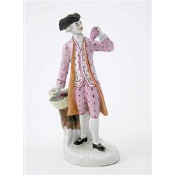 A Limbach figure of Autumn from a set of the Four Seasons, represented as a gallant standing hold...