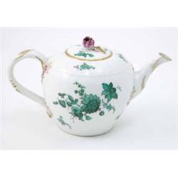 A Meissen globular teapot and cover with rosebud finial, branch handle and spout painted with bou...