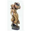 Image 1 : A large late 19th century Goldscheider figure, lady in flowing skirt holding wicker basket on one...
