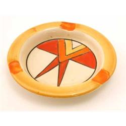 A Clarice Cliff Bizarre ash-tray, painted with an early geometric design in rust, orange and yell...