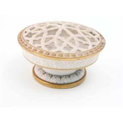 A Grainger & Co. Worcester pot pourri, of squat circular shape, the pierced cover with gilded rim...