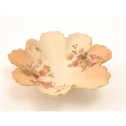 A late Victorian Royal Worcester leaf-dish, painted with flowers against an ivory ground, date co...