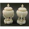 Image 1 : A pair of Grainger’s Worcester reticulated vases and covers, each vase in the form of a jardinier...