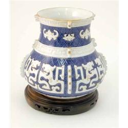 A Royal Worcester Moorish baluster vase, decorated with white and gilt calligraphic characters on...