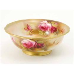 A Royal Worcester bowl, painted inside and out with rose sprays by Reginald Austin, circa 1923, 7...