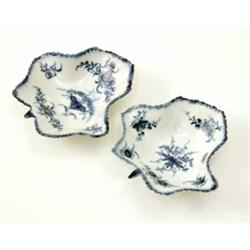 A near pair of Worcester leaf shape pickle dishes, painted in underglaze blue with floral sprays...