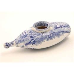 An early 19th century earthenware pap boat, printed with ancient abbey ruins in blue, 7in...