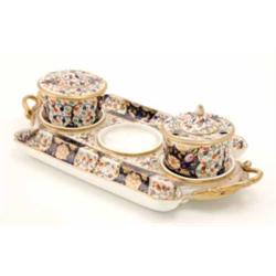 An early 19th century Derby bone china inkstand, fitted with two pen-trays, one inkwell (one miss...