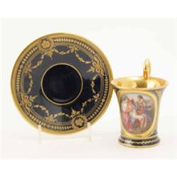 A 19th Century Vienna type cup and saucer, painted with an oval panel entitled beneath ‘Paris and...