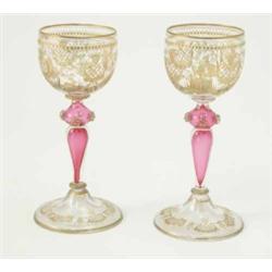 A set of six rococo style wine glasses, rounded bowls each engraved and gilded with a building, f...
