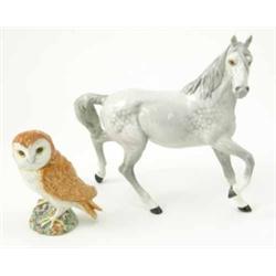 A Beswick model of a grey horse, 8.5ins and a Beswick owl, mould 2026...