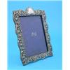 Image 1 : An Edwardian silver mounted photograph frame, with cartouche shape crest and foliate border, Birm...