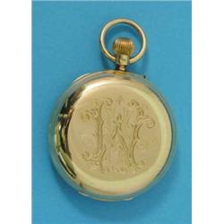 An Edwardian 18ct gold keyless karrusel hunter, with monogrammed case and enamelled Roman dial wi...
