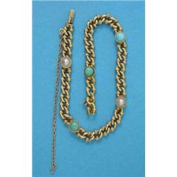 An Edwardian fancy link bracelet, set turquoises and split pearls...
